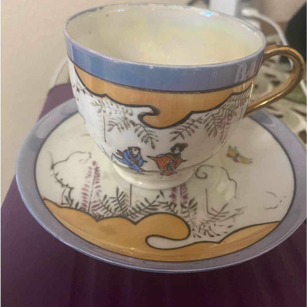 Set of two vintage cups and saucers.